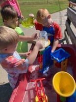 Water play at Preschool Beach Day